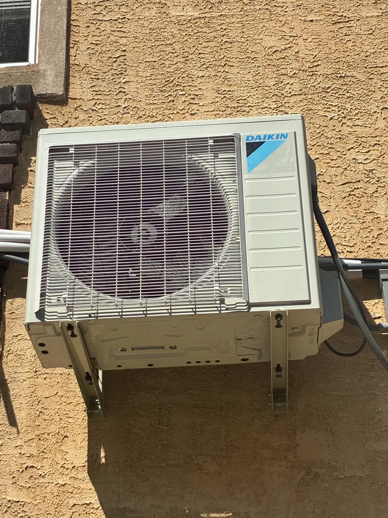 Ductless heat pump outdoor unit on a JJC International job