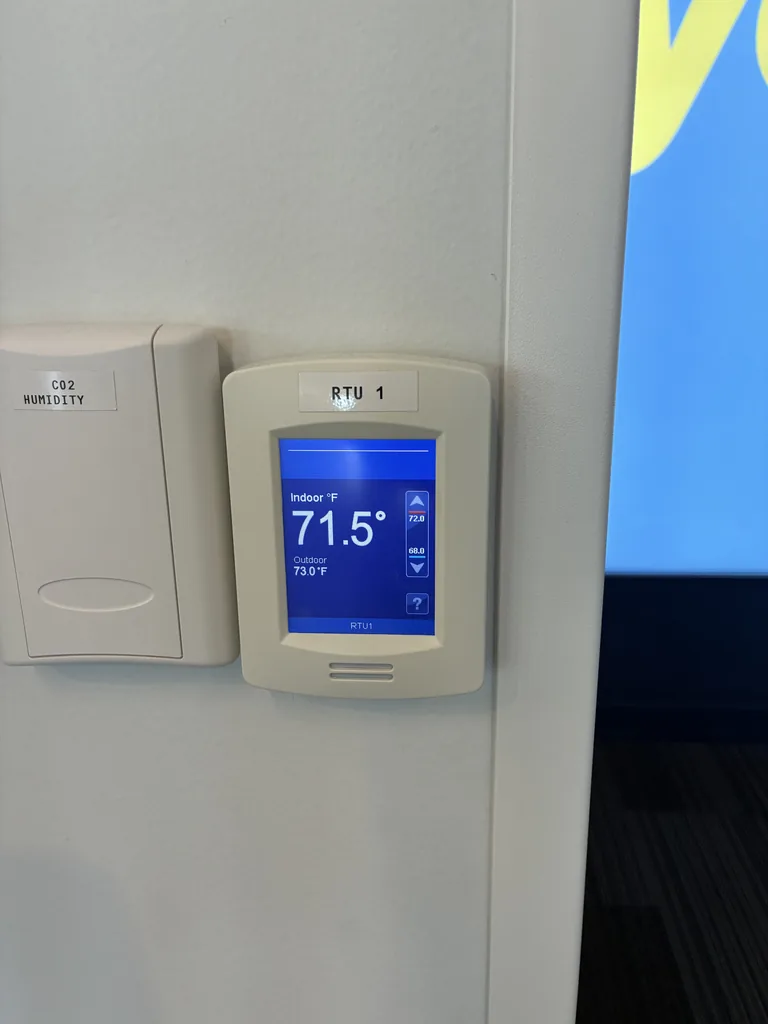 Digital wall thermostat on a JJC International job